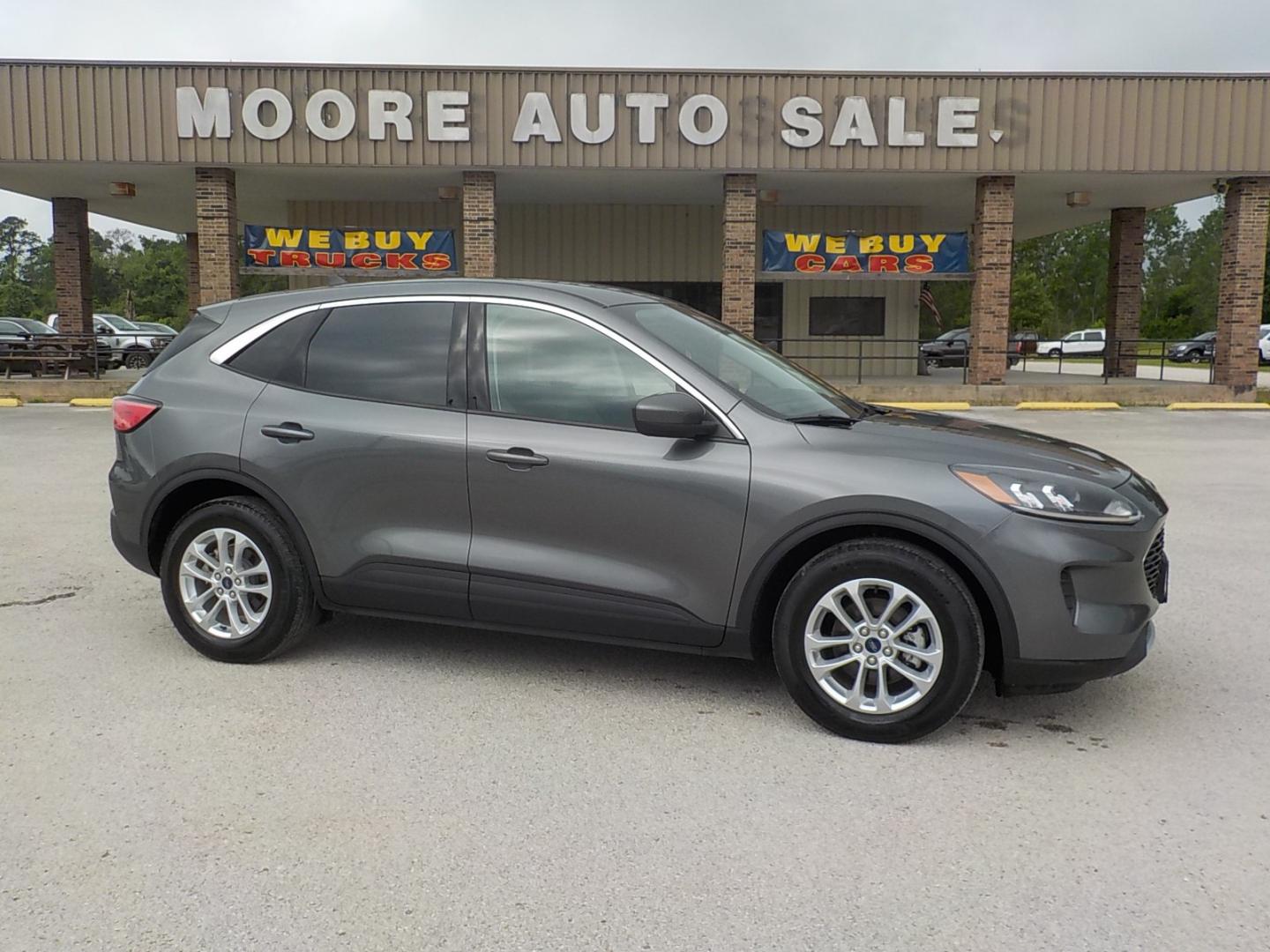 2021 Gray /Lt gray Ford Escape (1FMCU0G66MU) , Auto transmission, located at 1617 W Church Street, Livingston, TX, 77351, (936) 327-3600, 30.710995, -94.951157 - These vehicles get over 30 mpg on the highway!! - Photo#0